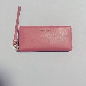 Michael Kors Burgandy Saffiano Leather Clutch. Wristlet strap. Used